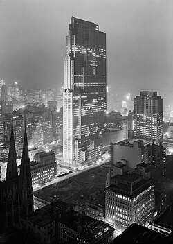 Black and white photo of the construction of Rockefeller Center in December 1933, with the RCA Building at center