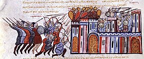 Depiction of an army attacking a walled town