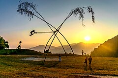Children playing traditional Dashain Swing in Nepal.