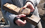 Cubes of maple sugar being made in a sugar press mold