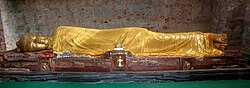 The ancient excavated Buddha inside the Parinirvana Temple, Kushinagar.