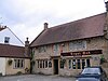 Stone building with sign saying The Royal Oak