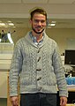 Image 136Man wearing shawl collar cardigan and hipster-inspired beard (from 2010s in fashion)