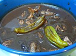 Dinuguan, a stew made from pig's blood, varies per region.