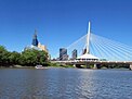 White side-spar cable-stay bridge over a river