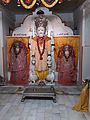 Idol of Brahma and his two consorts Gayatri and Savitri