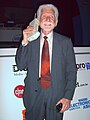 Image 63Martin Cooper of Motorola, shown here in a 2007 reenactment, made the first publicized handheld mobile phone call on a prototype DynaTAC model on 3 April 1973. (from Mobile phone)