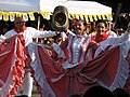 A Cumbia (Colombia) dancer holding a Sombrero vueltiao