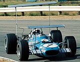 Jackie Stewart driving the MS10 at the 1969 South African Grand Prix with two wings (likely during qualifying)