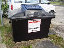 A large bin, with "GREASE ONLY" stamped on the lid.