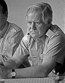 Goulding seated in a UN uniform