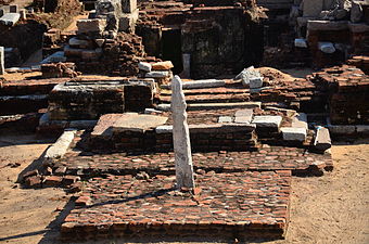 Stone vel on a brick platform at the entrance to the Murugan Temple, Saluvankuppam, unknown architect, 300 BC[98][99]