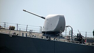 Side view of the Mk 45 main gun of USS Paul Hamilton