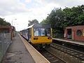 A Northern Rail Class 142 at the station.