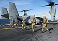 Turkish Marines board an MV-22 Osprey on the flight deck of the USS Kearsarge while participating in Turkish-led and hosted amphibious exercise Exercise Egemen