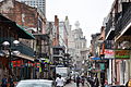 Bourbon Street New Orleans from St Louis Street by MusikAnimal, depicting Bourbon Street