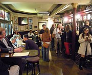 The bar, showing some of the memorabilia on display, including the head of the Hound of the Baskervilles