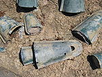 Bronze bells scattered on the ground.