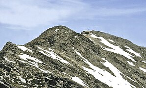 The Pico del Cervunal (foreground) and the Pico del Lobo (background) in El Cardoso de la Sierra. The Pico del Lobo stands as the tallest summit in the region at 2,273 metres above mean sea level.[11]