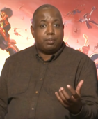 A photograph of Kemp Powers during an interview promoting Spider-Man: Across the Spider-Verse