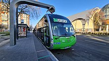 Irizar ie tram being charged by an overhead power source