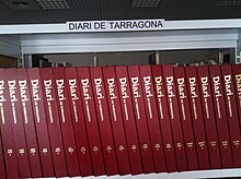 A row of bound volumes of the newspaper