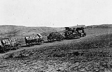 Tractor pulling ammunition wagons