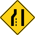 Road narrows on the left