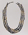 Sumerian necklace beads; 2600–2500 BC; gold and lapis lazuli; length: 54 cm (21 in); Metropolitan Museum of Art (New York City)