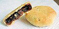 Image 5Eccles cake is a small round flaky pastry cake filled with currants, sugar and spice. It is native to Eccles. (from Greater Manchester)