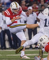 Craddock kicking a field goal against the Penn State Nittany Lions