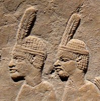 Nubian prisoners.They wear the typical one-feathered headgear of Taharqua's soldiers.[28]