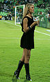 Image 26Sports anchor wearing little black dress and knee-high boots, Mexico, 2010 (from 2010s in fashion)