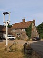 The former Crown pub on Gangsdown Hill, pictured before being reopened as a café and makerspace.[13]