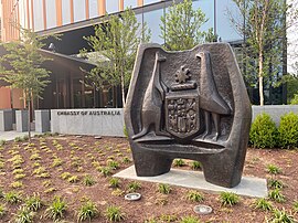 The sculpture "Australian Seal" by Tom Bass, featuring a kangaroo, an emu, and the Australian shield, outside the Embassy of Australia in Washington, D.C.