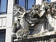 Dragon sculpture on the side of the Monument