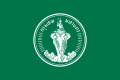 A green rectangular flag with the seal of Bangkok in the centre