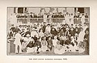 The first session of the Indian National Congress in 1885. A. O. Hume, the founder, is shown in the middle (third row from the front). The Congress was the first modern nationalist movement to emerge in the British Empire in Asia and Africa.[390]