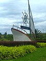 A landmark at the intersection of Federal Route 53 and the Seremban-Port Dickson Highway, near Lukut. The sign translates to "Welcome to Port Dickson".