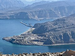 Khasab Harbor, with Atana Khasab Hotel in foreground and station for over-sea zipline