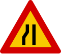 Road narrows on left hand side