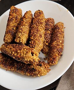 Orkh Armenian Kofta made with meat and bulgur served in cylindrical shapes