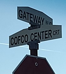 Street sign in 2022 still showing "COFCO" name