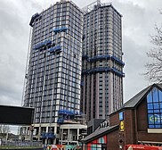 New homes under construction adjacent to the 17&Central shopping centre in 2024