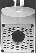 The cylinder has been cooled from 4.2 K to 1.6 K. The current in the electromagnet has been kept constant, but the tin became superconducting at about 3 K. Magnetic flux has been expelled from the cylinder (the Meissner effect).