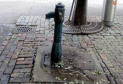 Hydrant at Fredantori square in Helsinki, Finland