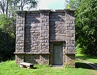 A weir in Sleepy Hollow. The weir chambers were used to empty the aqueduct for maintenance by diverting the waters to a nearby waterway. The line could be emptied in two hours.[21]