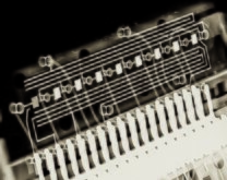 X-Ray of an 8-digit 7-segment multiplexed LED display from a 1970s calculator