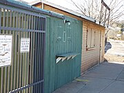 The original ticket booth made of wood of the Warren Ballpark.