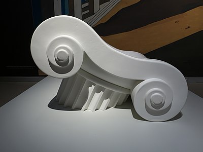 Postmodern reinterpretation of the Ionic column as the Capitello seating, designed by Studio 65 and produced by Gufram, differentiated-density polyurethane foam coated with latex rubber, 1972, unknown location[37]